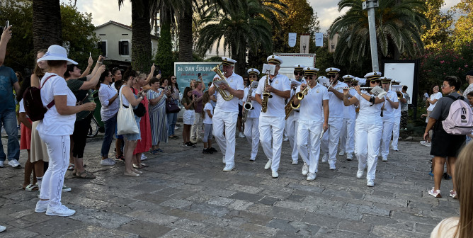 A musical orchestra plays on Shirun Day in Budva